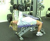 girl doing DB chest presses