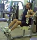 man doing pec deck machine